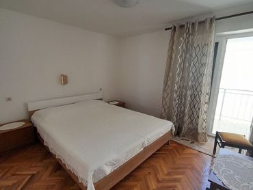 bedroom with balcony