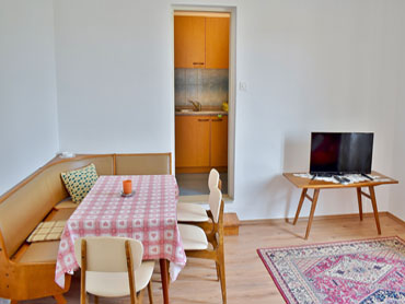 kitchen and dining area, flat-screen TV