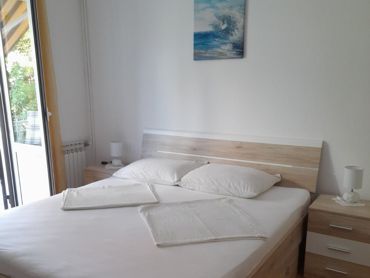 bedroom with balcony