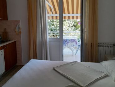 bedroom with balcony
